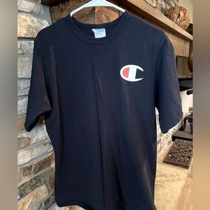 Mens navy blue shirt sleeved “Champion” shirt